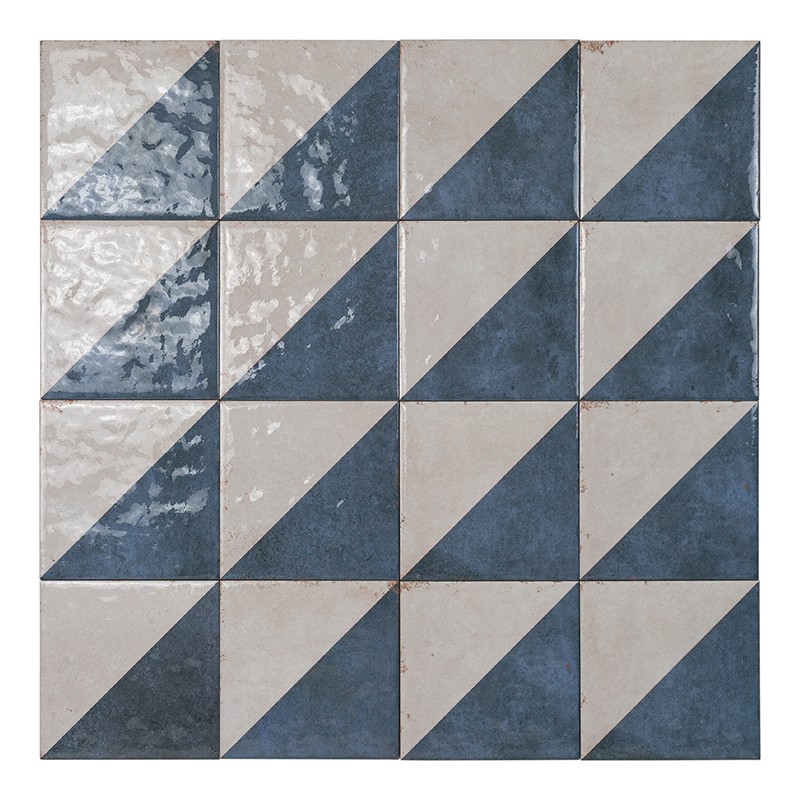 Tile composed of 16 squares in a geometric pattern: each tile divided into two diagonal triangles alternating dark blue and cream, glazed surface with shine and visible joints.