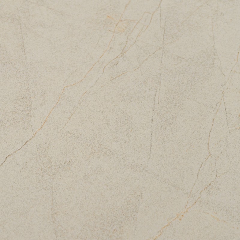 Pale cream tile with fine light brown and grey veins, smooth surface with a marble-like appearance; suitable for walls or floors in interior spaces.