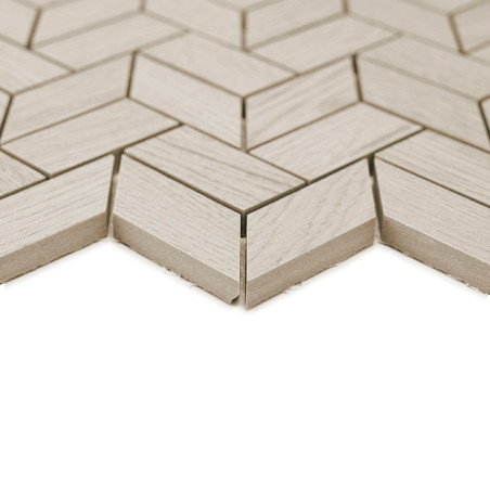 Beige, rechthoekige tegels gerangschikt in een chevronpatroon zijn stevig in elkaar grijpend en vormen een naadloos en gestructu