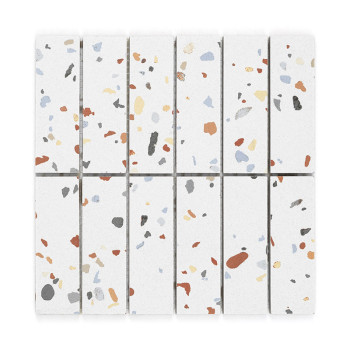 Ceramic tiles display scattered, multicolored terrazzo patterns on a white background, arranged in neat vertical rows for decora