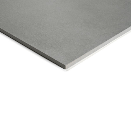 Um ladrilho cinza liso e retangular com bordas afiadas repousa sobre um fundo branco, sugerindo um design moderno e minimalista Um ladrilho cinza liso e retangular com bordas afiadas repousa sobre um fundo branco, sugerindo um design moderno e minimalista