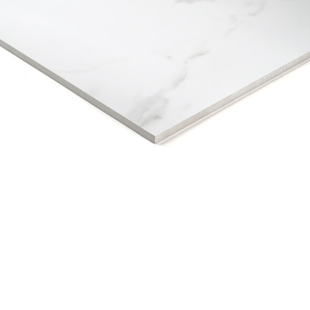 A smooth, square tile with a white marble appearance sits against a plain white background, showing its polished surface and sha A smooth, square tile with a white marble appearance sits against a plain white background, showing its polished surface and sha