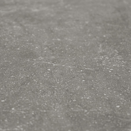 In close-up verschijnt een gestructureerd, mat tegeloppervlak met subtiele spikkels en variaties in een gedempte grijze kleur, w In close-up verschijnt een gestructureerd, mat tegeloppervlak met subtiele spikkels en variaties in een gedempte grijze kleur, w