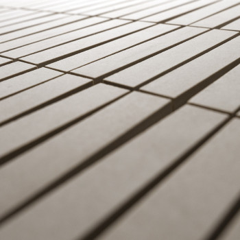 Des carreaux beiges rectangulaires sont posés à plat en rangées parallèles, créant un motif linéaire, entouré d'un arrière-plan 