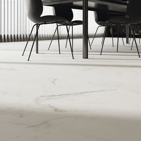 White marble tile spans the floor, adding elegance under a modern dining table with black chairs. Sunlight filters through verti White marble tile spans the floor, adding elegance under a modern dining table with black chairs. Sunlight filters through verti