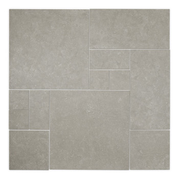 Graue Keramikfliesen weisen ein modulares Muster mit verschiedenen rechteckigen und quadratischen Formen auf. Die strukturierte 