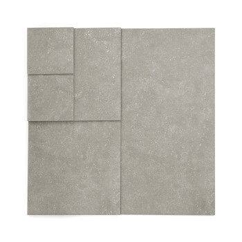 Das Fliesenset besteht aus vier rechteckigen, grauen Fliesen unterschiedlicher Größe, die auf weißem Hintergrund angeordnet sind
