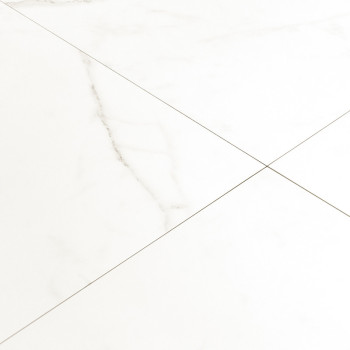 White marble tile features faint gray veins, forming a classic grid pattern. it rests on a flat, smooth surface in a minimalist 