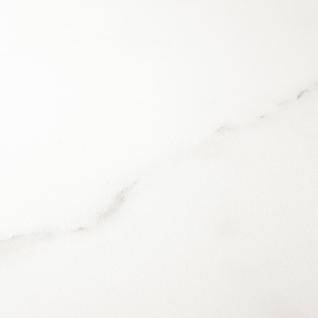 A smooth, white tile features subtle gray marbling, creating a calm, minimalist appearance suitable for modern interior spaces.