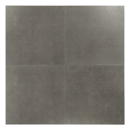 A dark gray, smooth, square ceramic tile with slight texture. divided into smaller squares by faint lines, centered against a pl