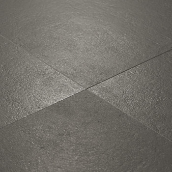 Dark gray textured tiles are arranged in an intersecting grid pattern, displaying a natural stone finish in a well-lit indoor se