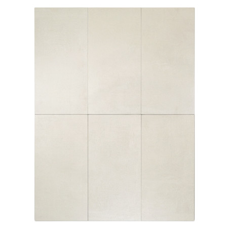 Seis azulejos rectangulares de color crema están dispuestos en dos filas y tres columnas, creando una superficie lisa y minimali