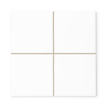 A white ceramic tile divided into four equal squares by thin beige grout lines, creating a simple and minimalist design.