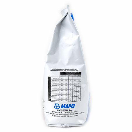 A white bag of Mapei resin cement stands upright, featuring a dosage chart and company contact information on its front.