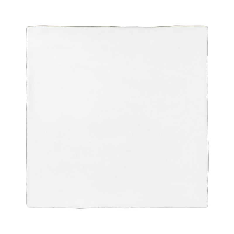 Un azulejo blanco liso y cuadrado descansa sobre un fondo neutro, con bordes ligeramente irregulares, lo que sugiere una aparien