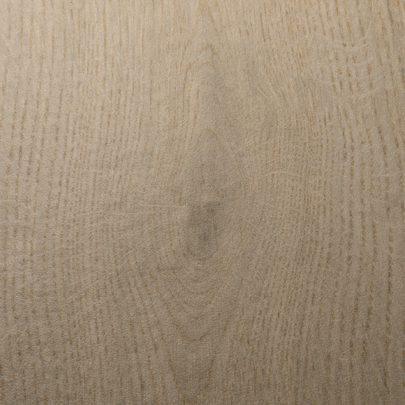 Carreau de céramique marron clair imitant le grain du bois naturel, affichant des motifs subtils et linéaires, créant une atmosp