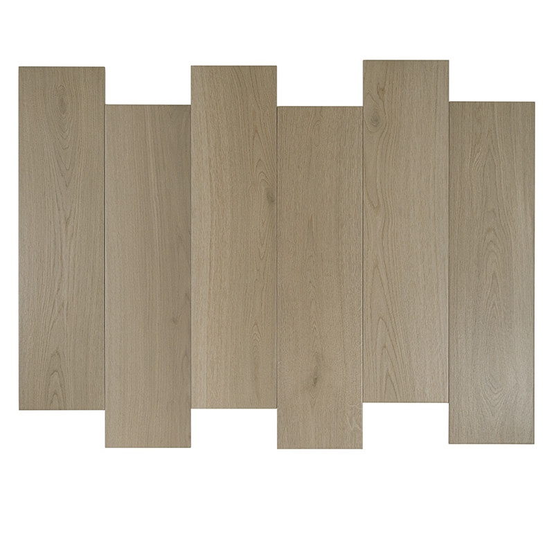 Rectangular wooden tiles are arranged in a staggered pattern, resembling planks. The smooth, light brown surface has subtle wood
