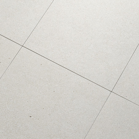Les carreaux de pierre grise sont alignés selon un motif en grille, formant une surface de sol lisse et uniforme. De fines ligne Les carreaux de pierre grise sont alignés selon un motif en grille, formant une surface de sol lisse et uniforme. De fines ligne