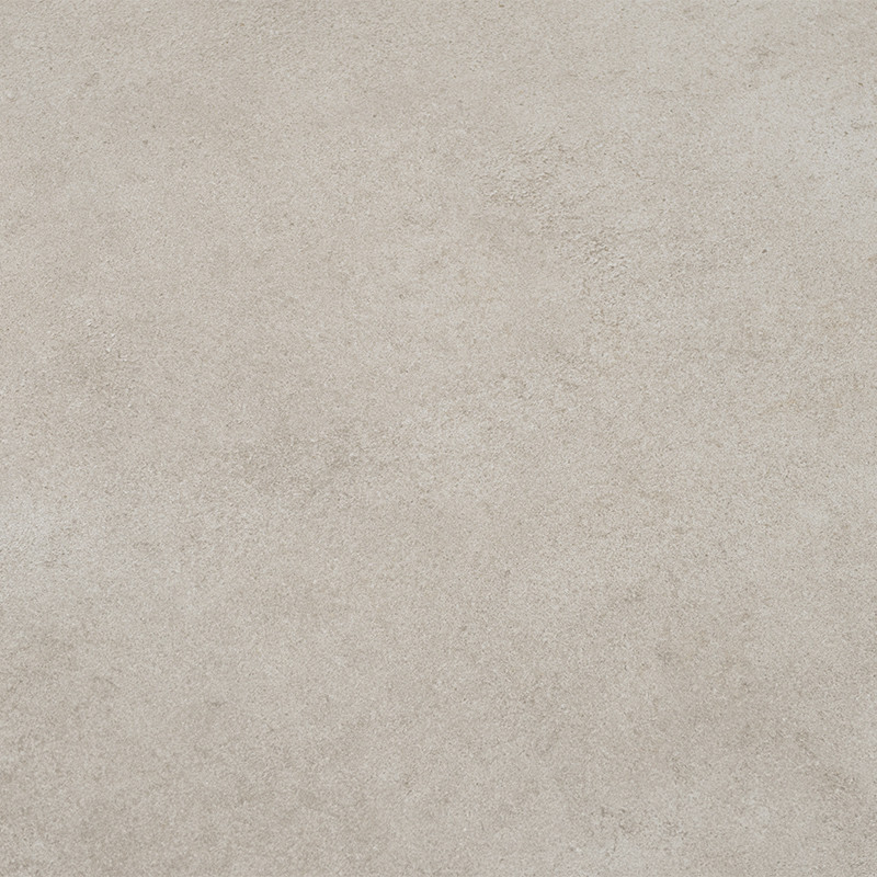 Light beige ceramic tile with a subtle cement-like texture; matte surface with tonal variations and micro-granulation, typical of continuous floors or coverings without adjacent elements.