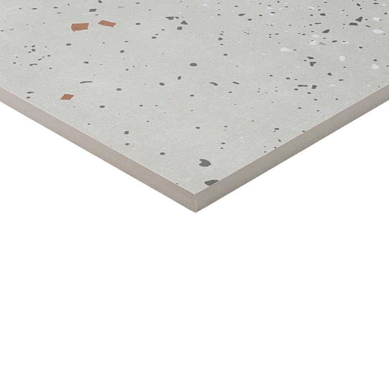 Rectangular tile (corner) light gray with terrazzo-type flecks in dark and terracotta tones, thin thickness, isolated on white background, perspective view.