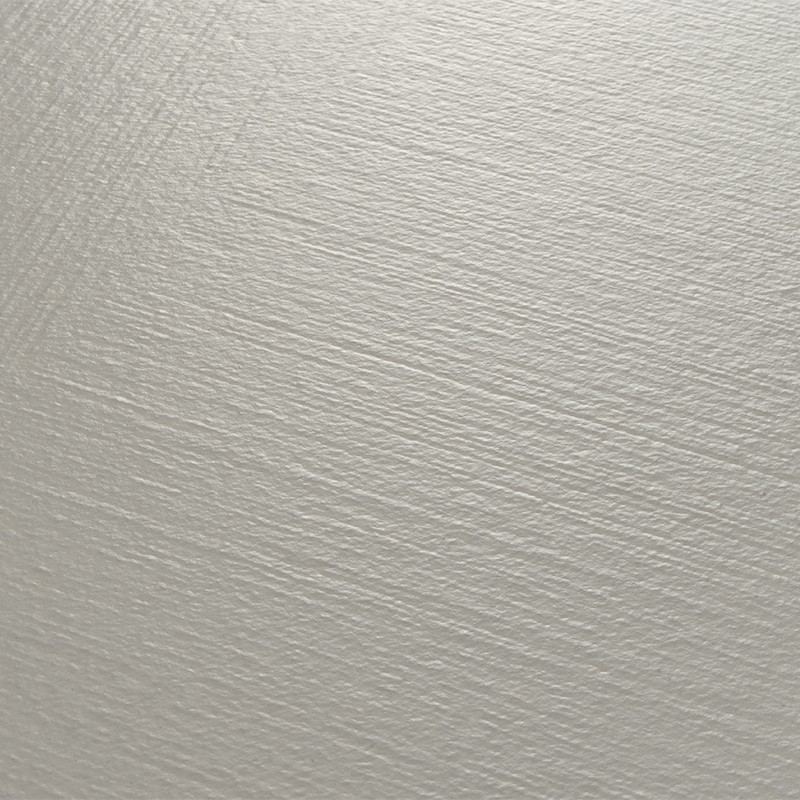 Grayish cream-colored tile with a fine texture in diagonal lines; matte and uniform surface; context: foreground without other elements, soft lighting.