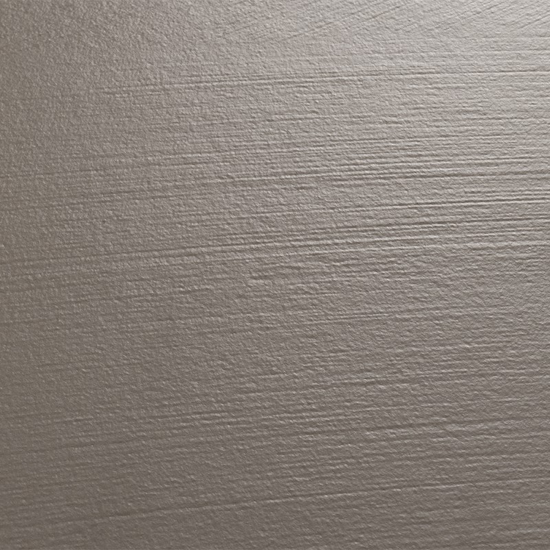 Azulejo beige con textura rugosa de estrías horizontales; superficie mate y uniforme, probablemente una pared o suelo, entorno no visible.
