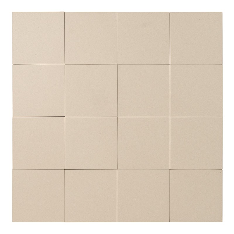 Square beige tile with a smooth surface and uniform tone; supported on a white background, without joints or additional elements visible.